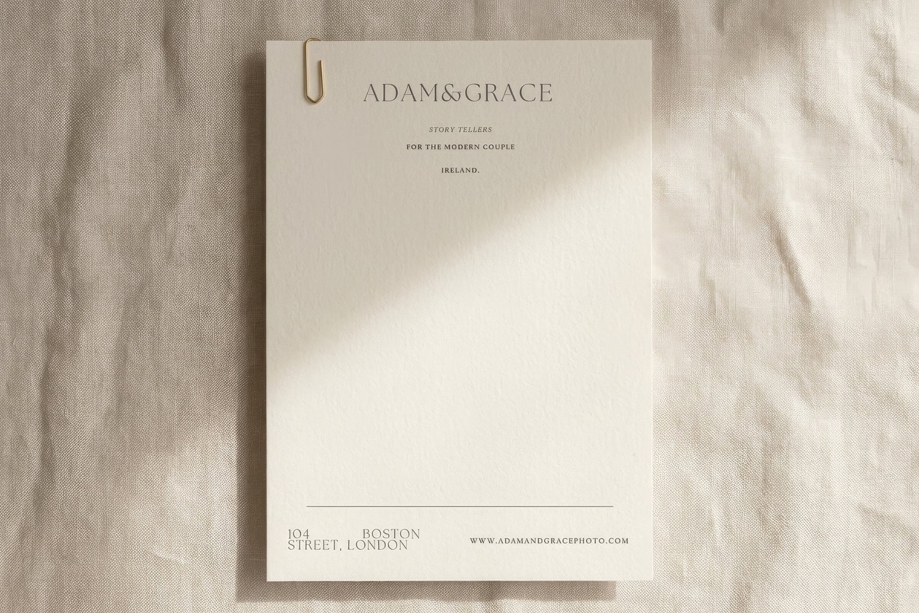 Minimal letterhead template on a soft neutral surface