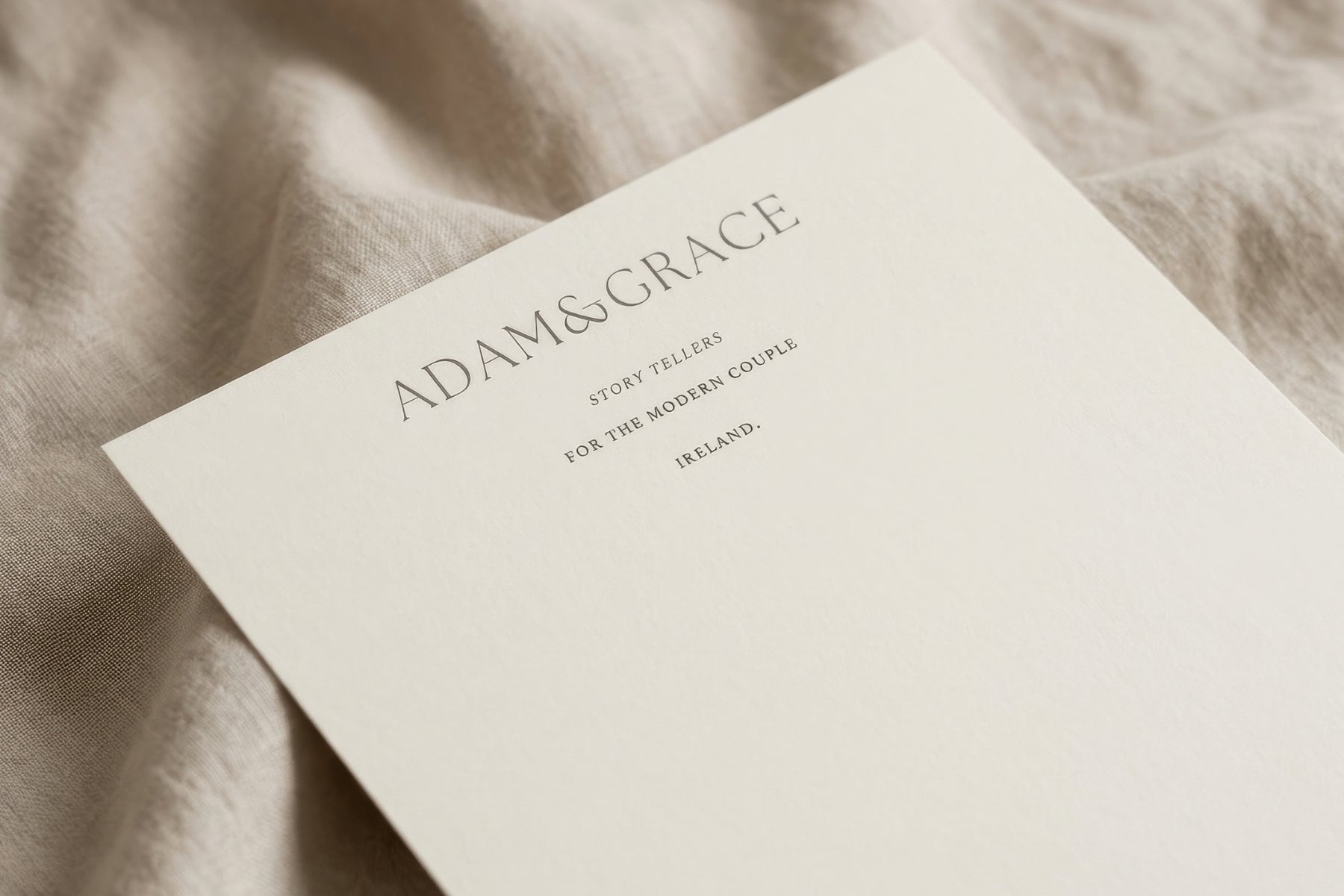 Adam and Grace letterhead on a soft neutral background