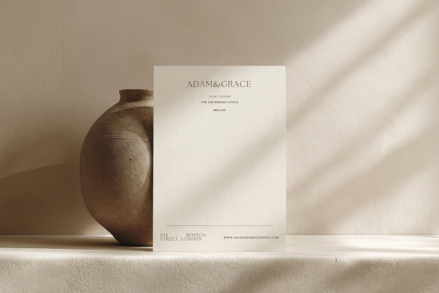 Letterhead styled with a ceramic vase, editorial branding