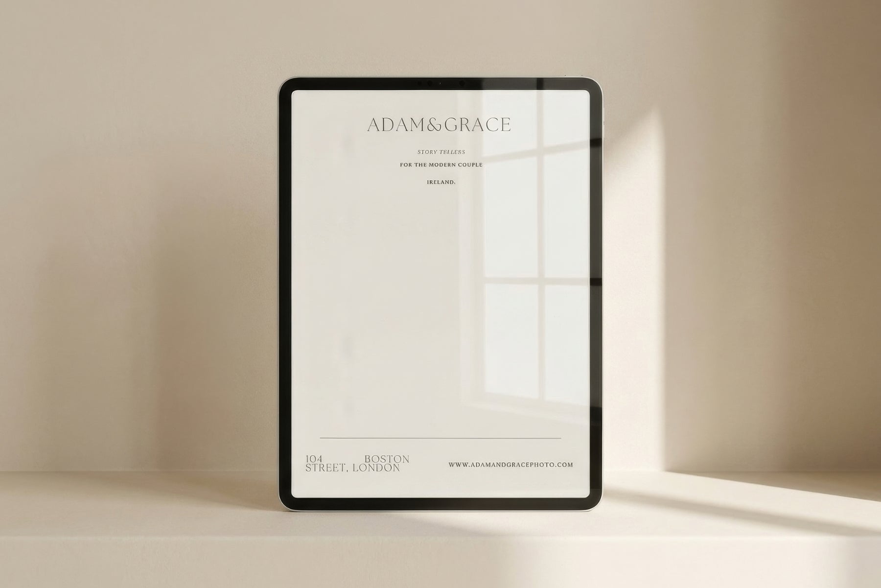 Letterhead template shown on a tablet in soft light